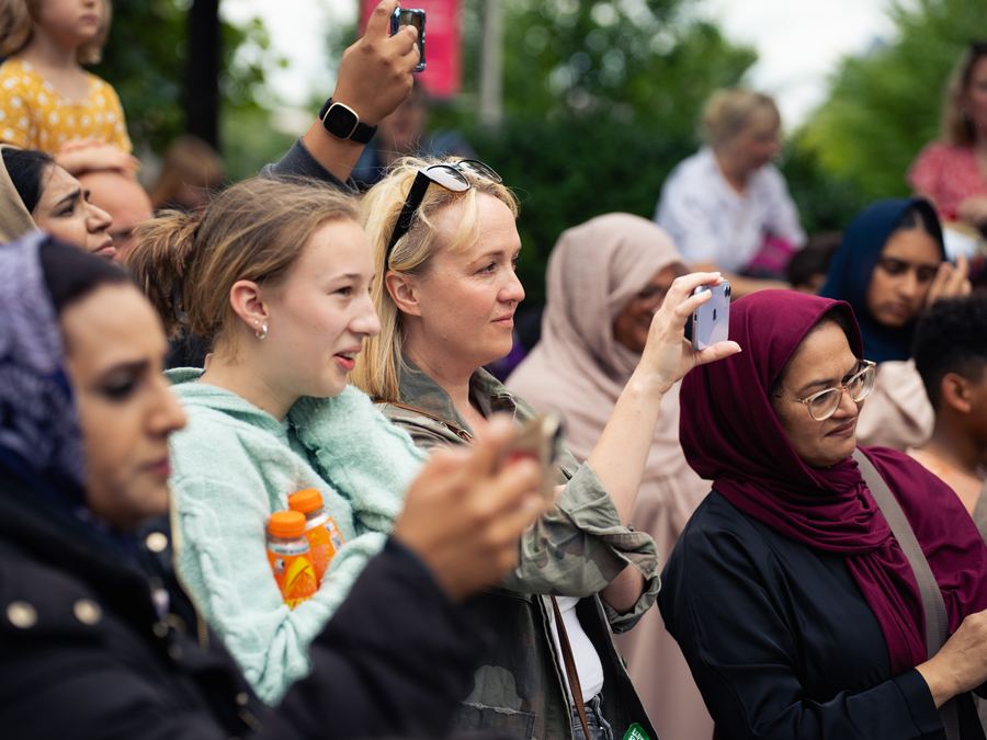 Crowd engaging at a community festival